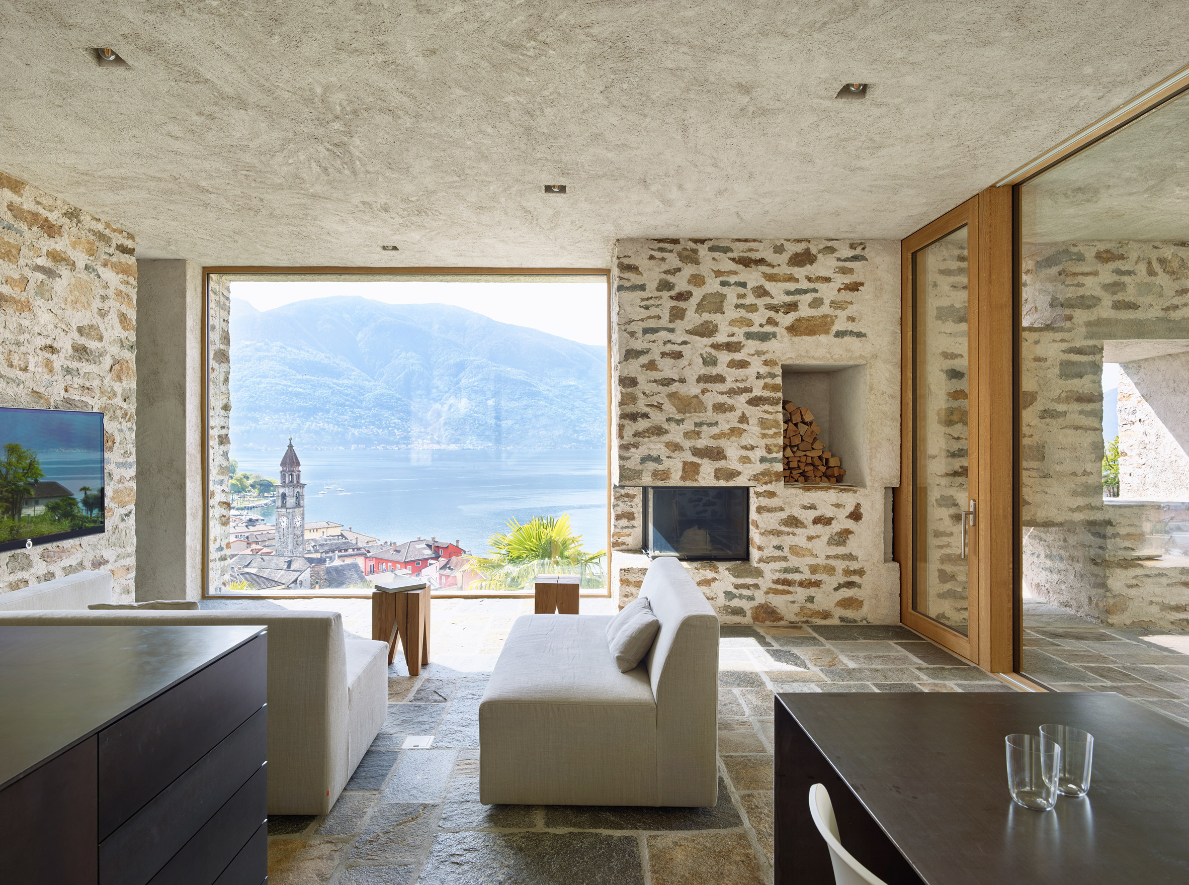 Wespi de Meuron Romeo uses stone and plaster for lakeside house-11