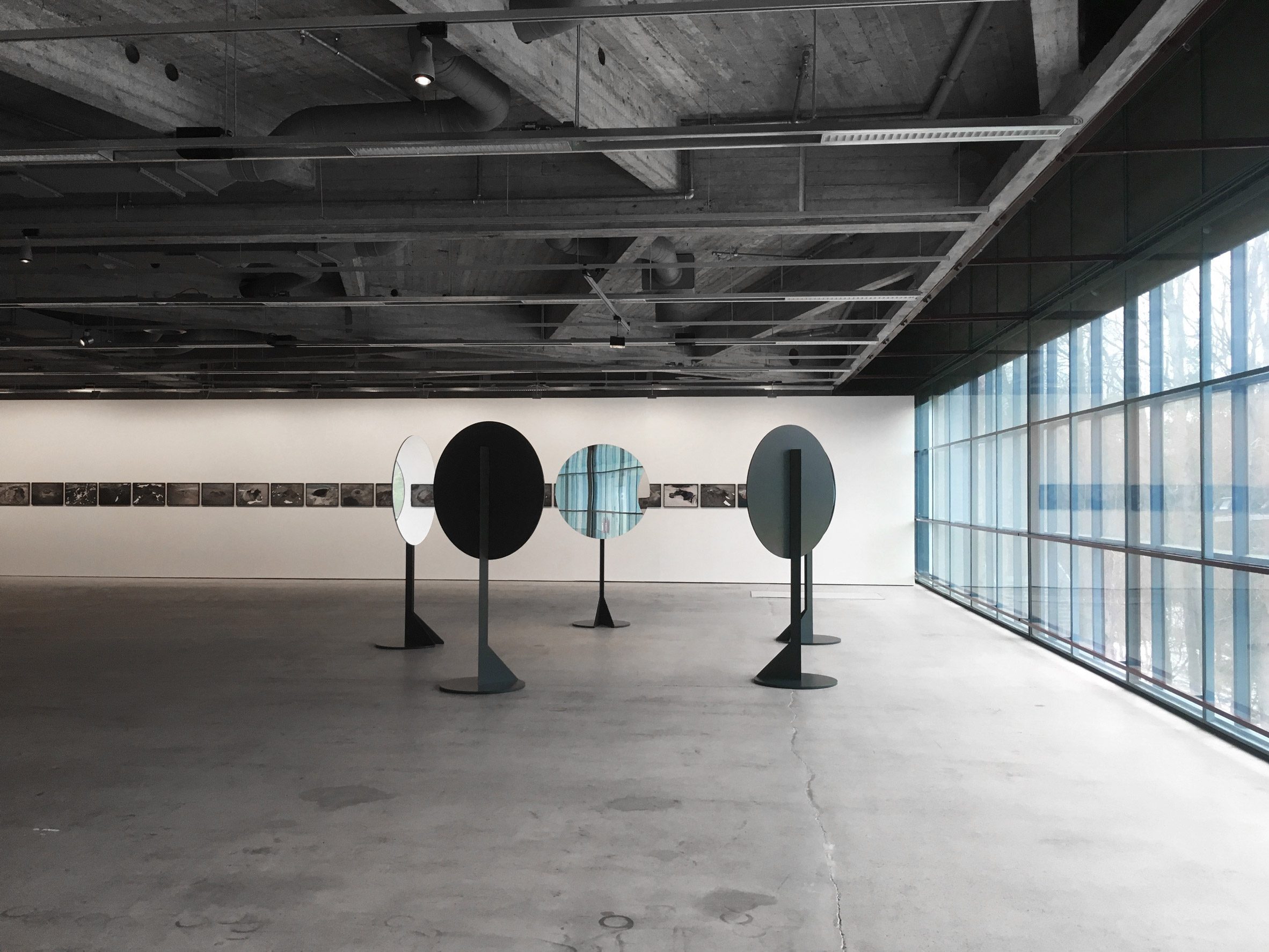 Tony Erapüro bases exhibition identity on Olafur Eliasson mirror installation-6
