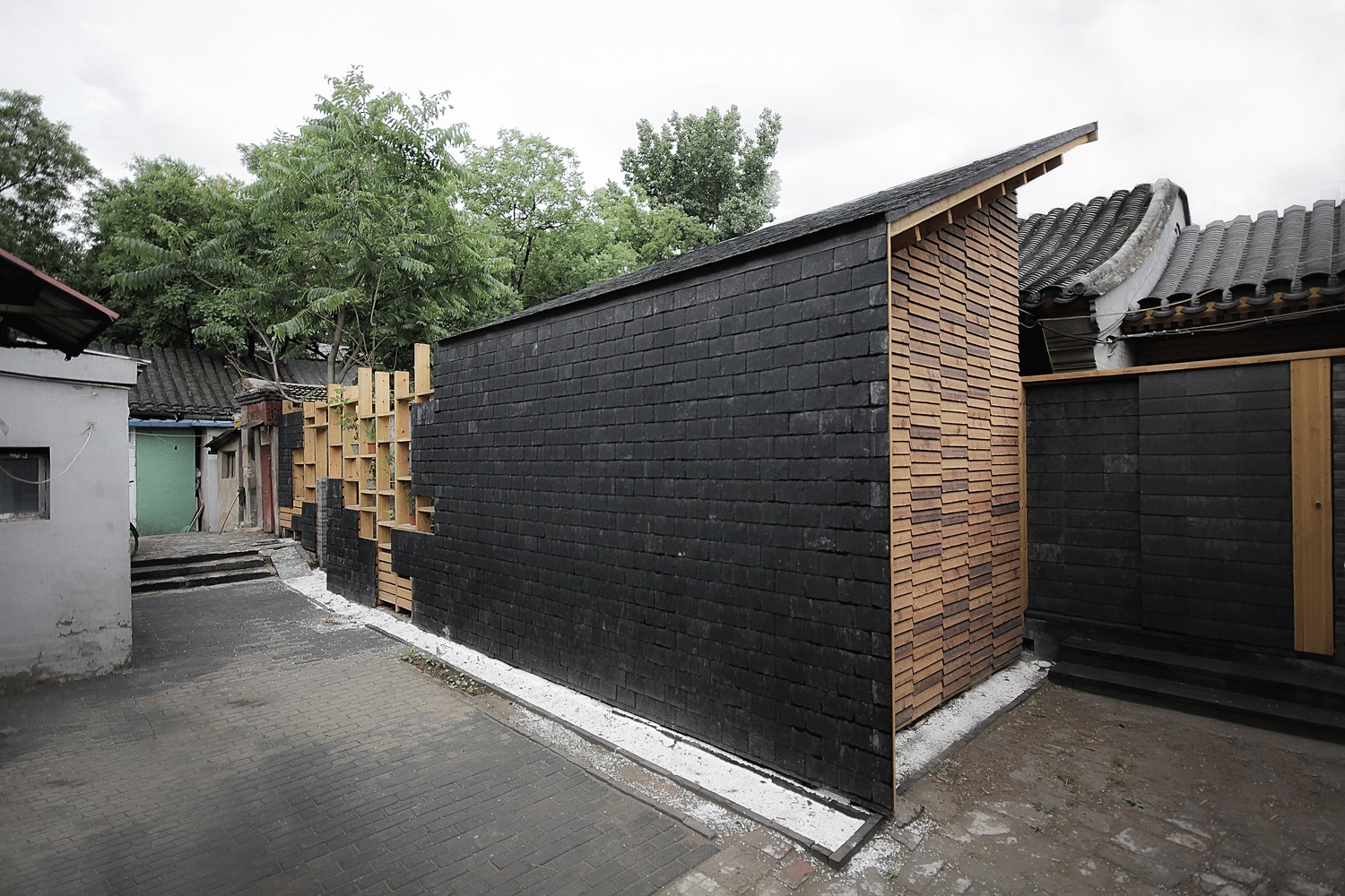 胡同画室——墙体像素化，木架结构打造连续统一视觉效果-10