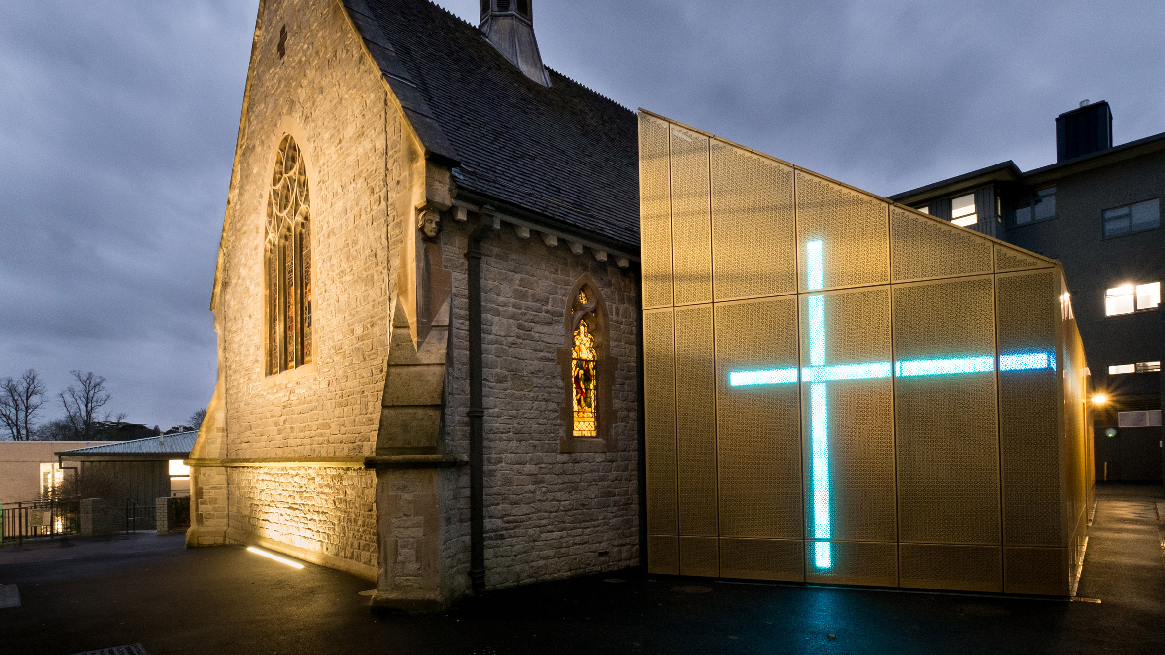 Gold extension added to Winchester university chapel by Design Engine-0