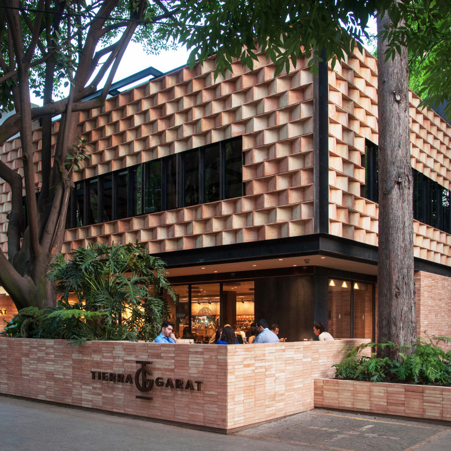 Faceted wooden panels form Mexico City cafe by Esrawe and Cadena-0