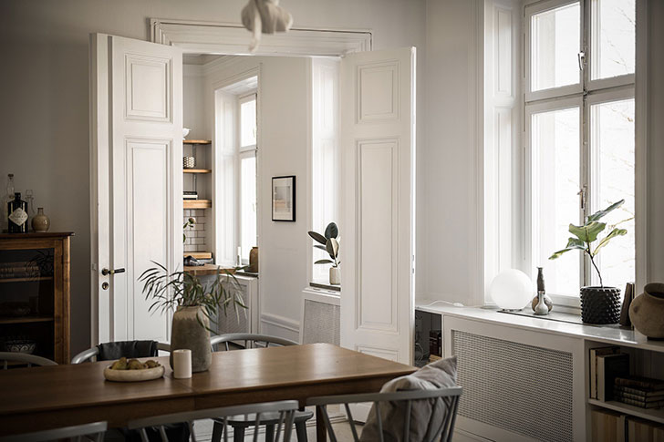 温馨暖色调的斯堪的纳维亚公寓设计-10