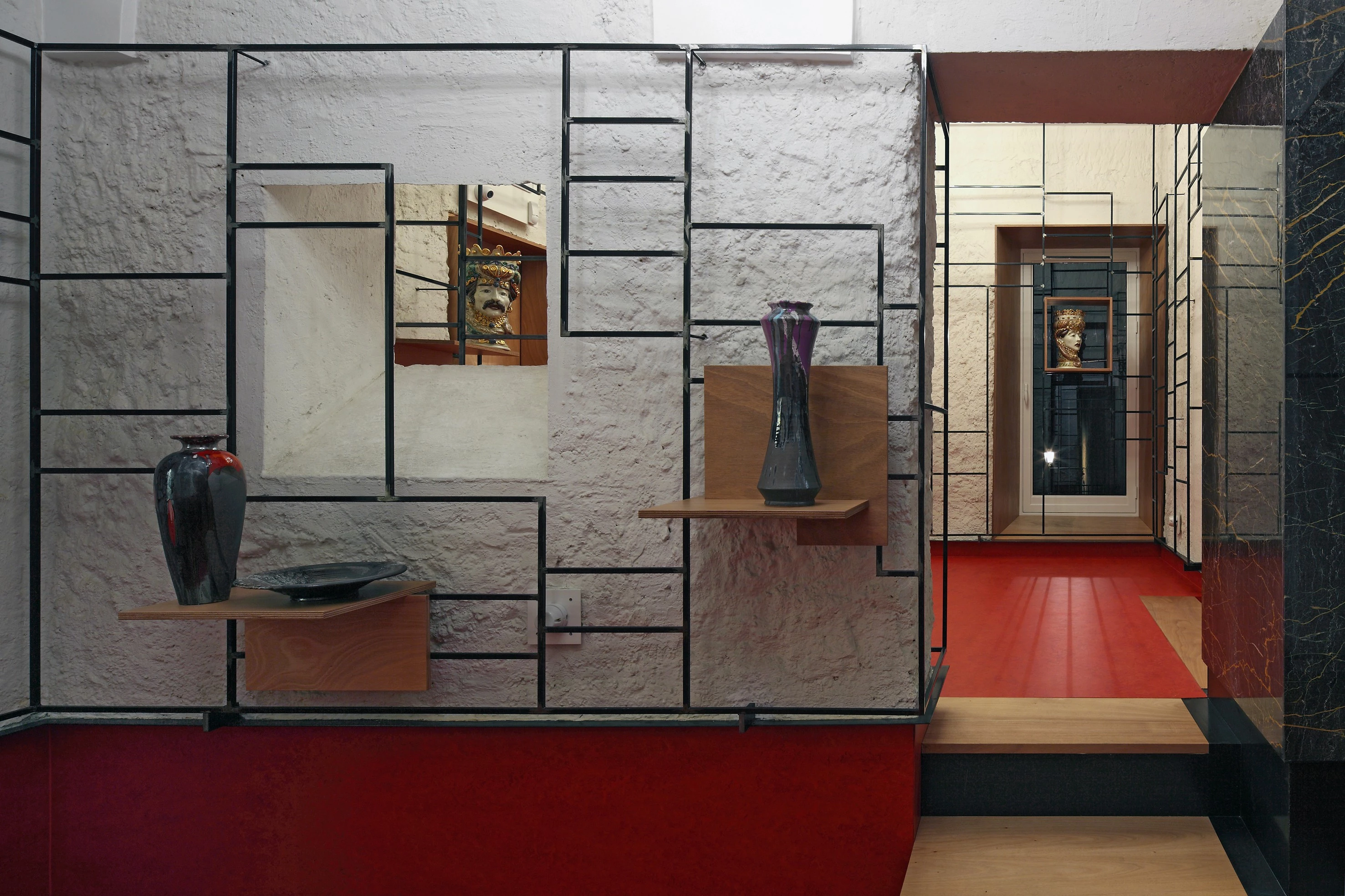 意大利 Caltagirone 百年建筑中的现代商铺设计-19