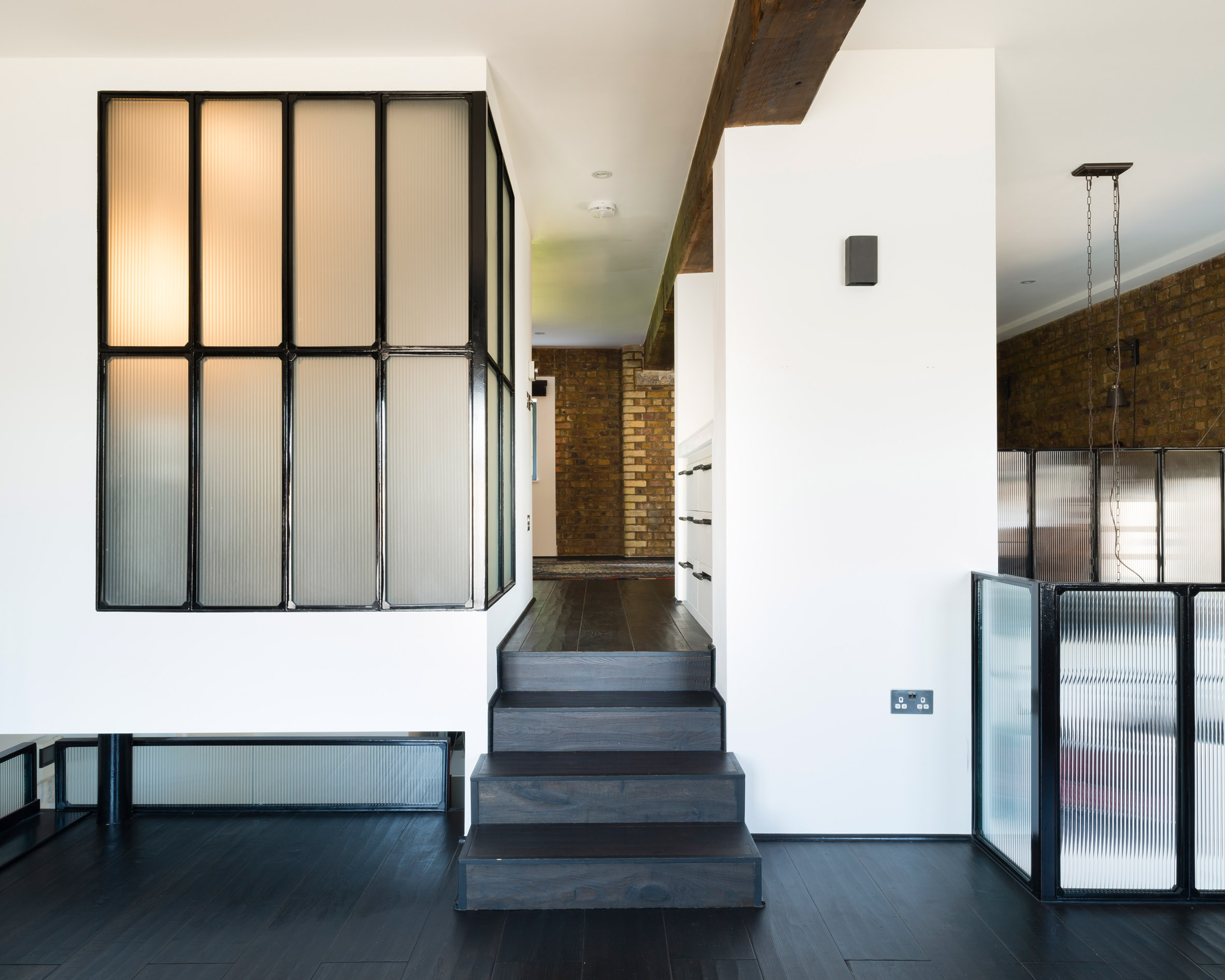 Feix - Merlin creates open-plan interiors for warehouse on the banks of London's River Thames-12