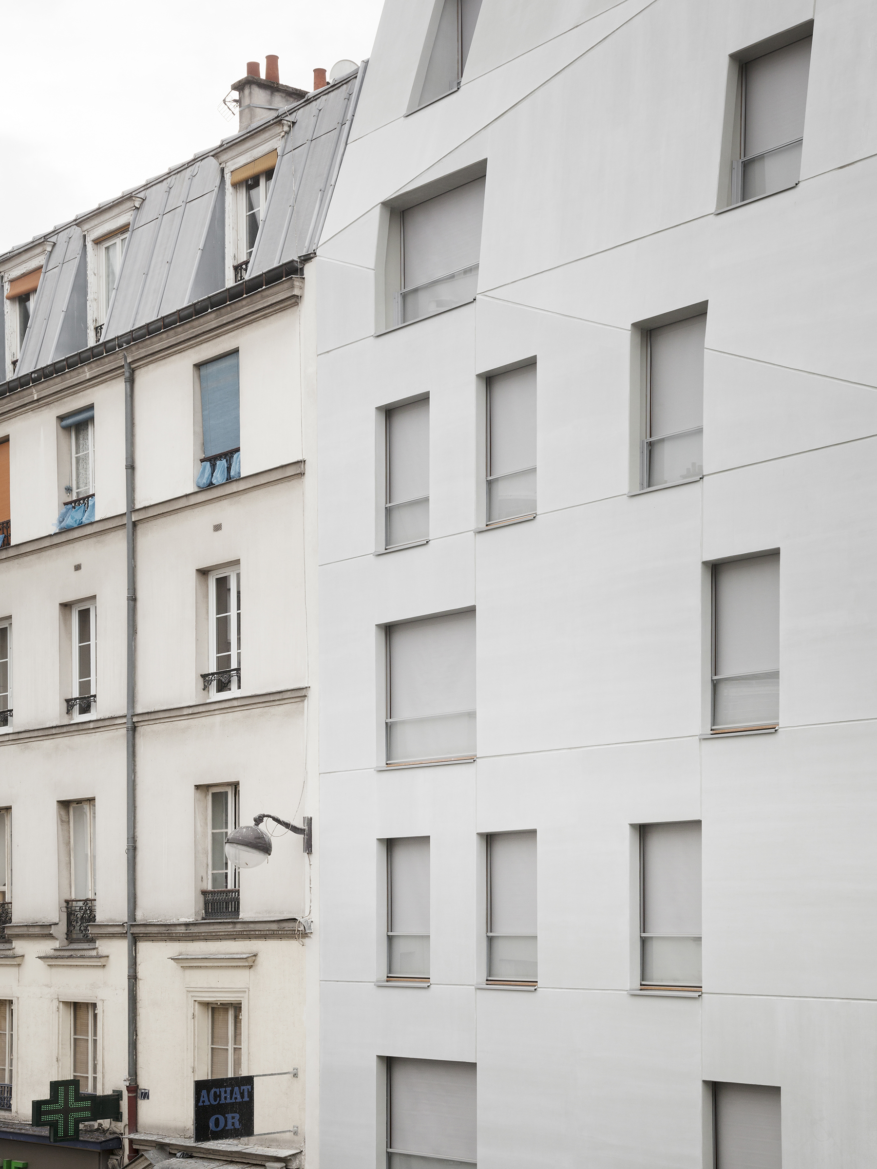 14 housing units 1 retail space rue saint maur paris 10-26