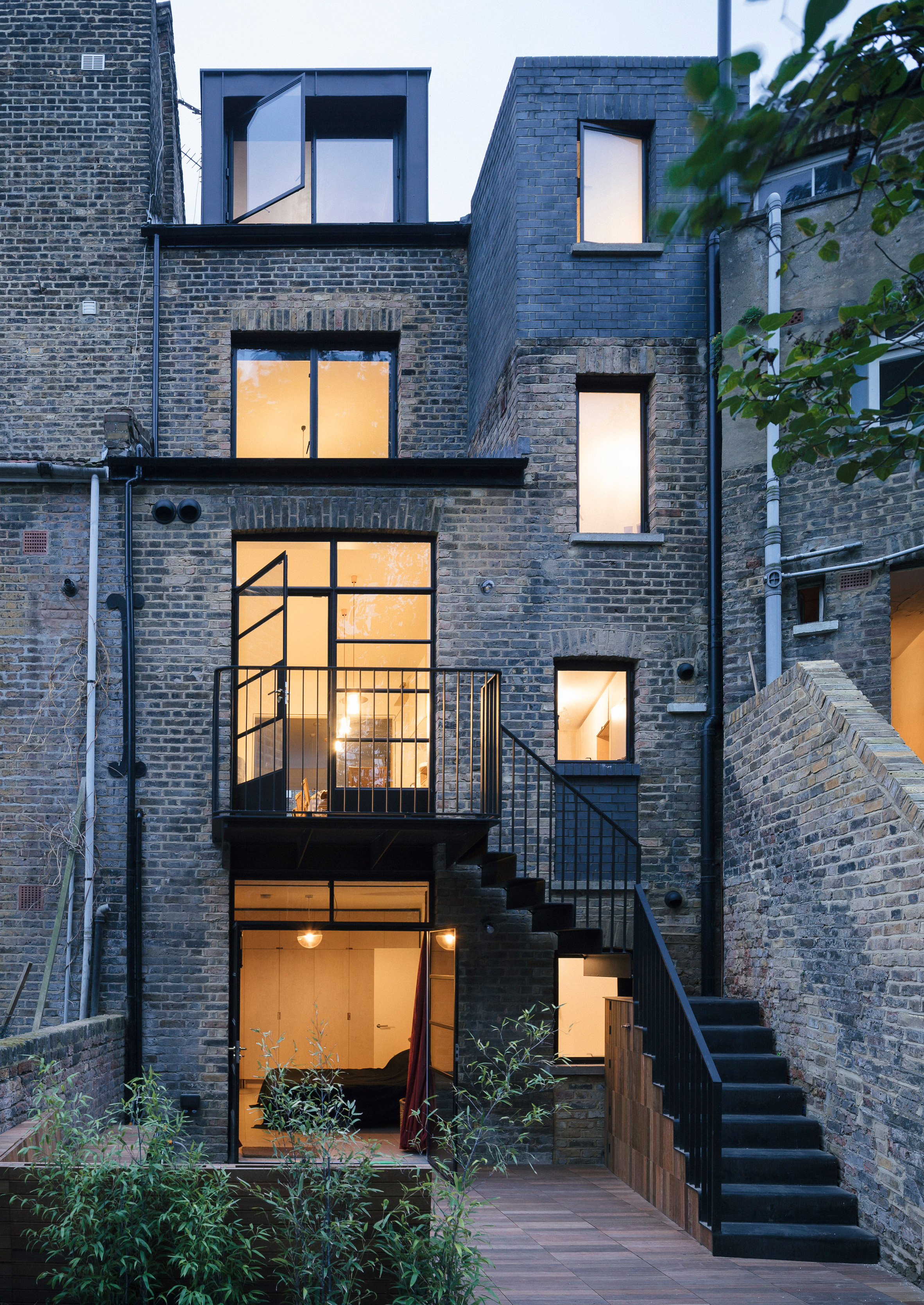 Tsuruta Architects designs staircase in London house from thousands of plywood pieces-31