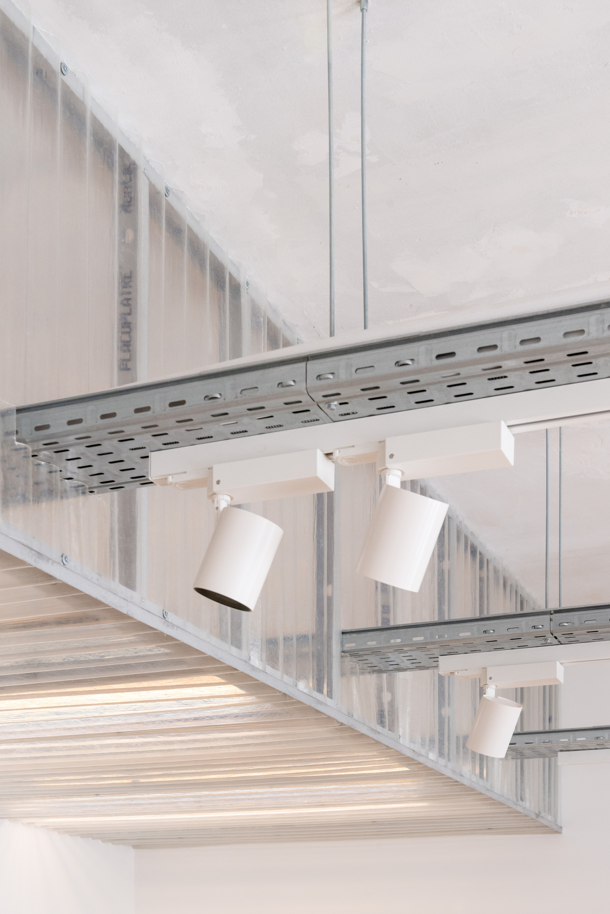 巴黎 Papier Tigre 纸品店革新设计,呈现极简风格与材料运用-19