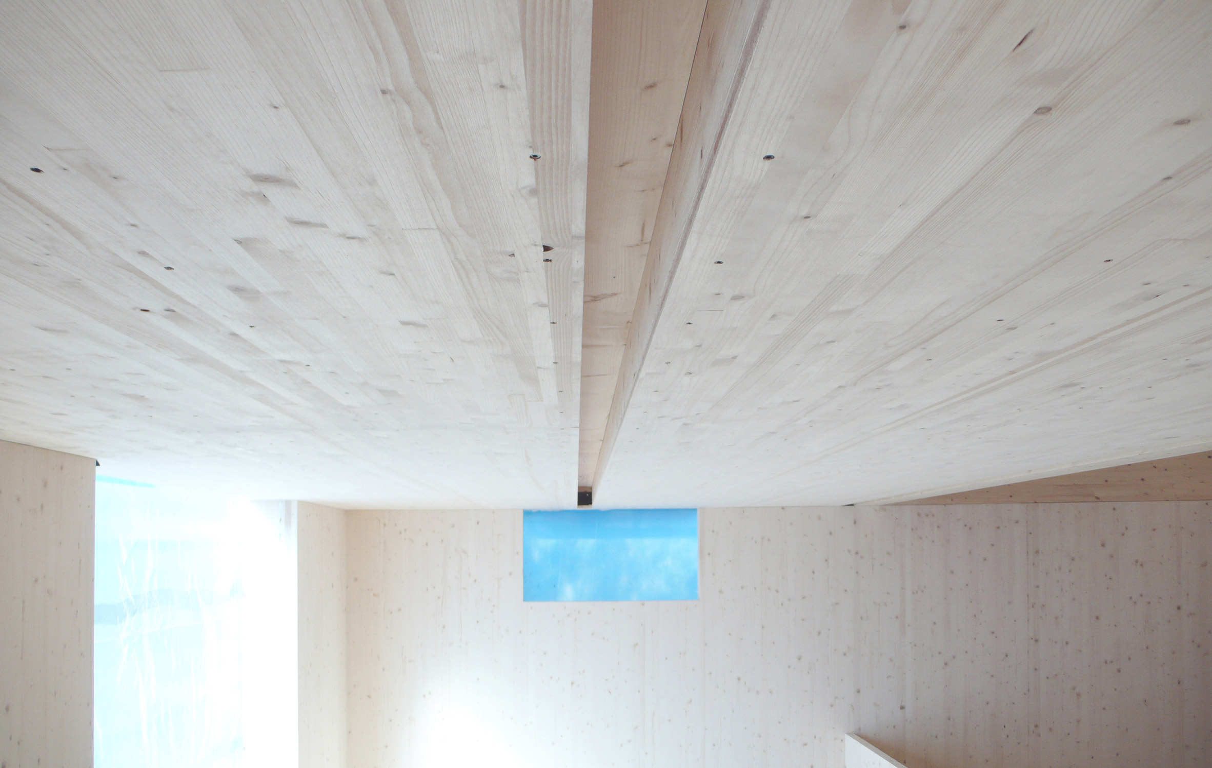 This prefabricated wooden holiday home is clad in charred timber boards-32