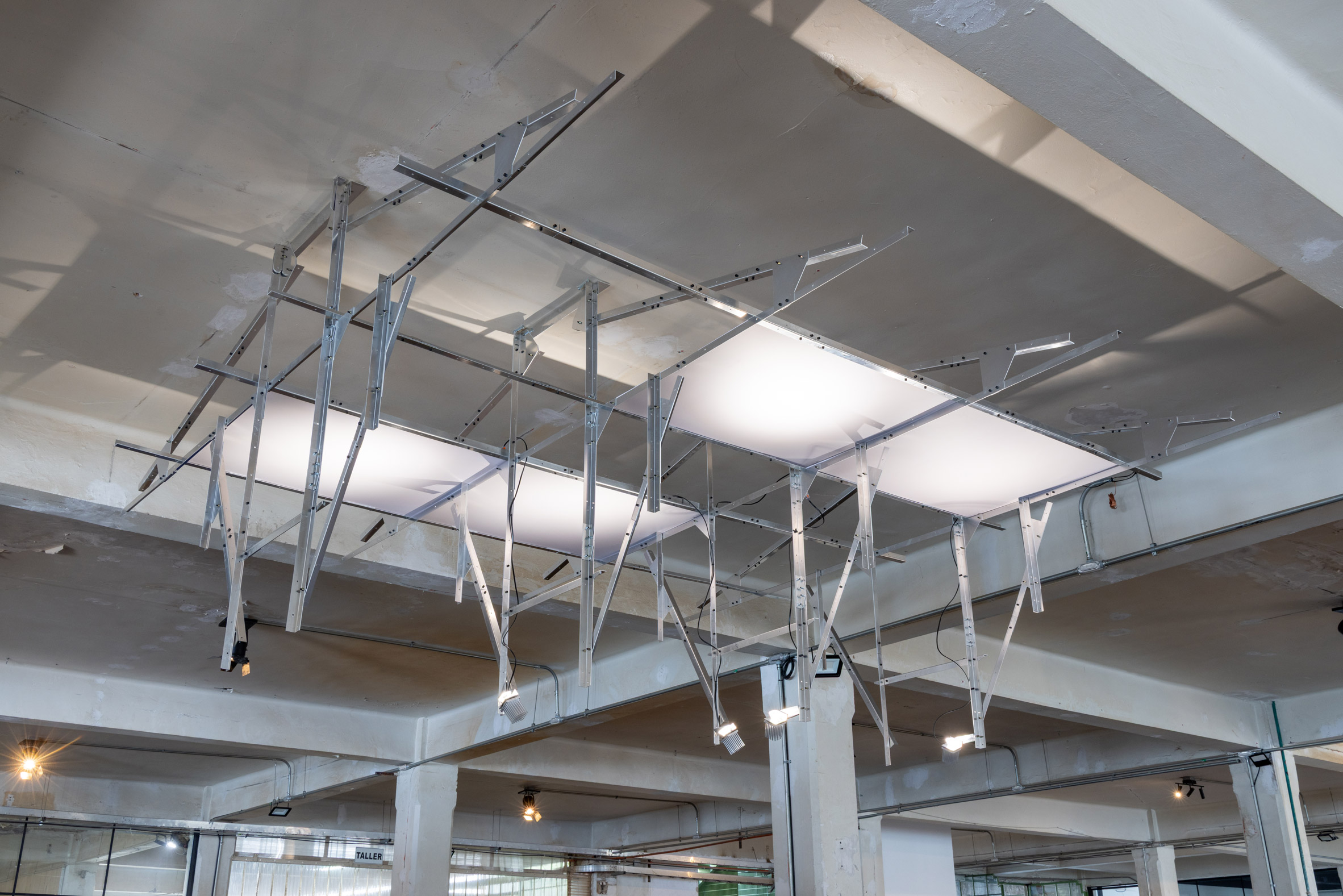 Architects respond to "excess and demolition" at Mexico City art week reuse exhibition-19