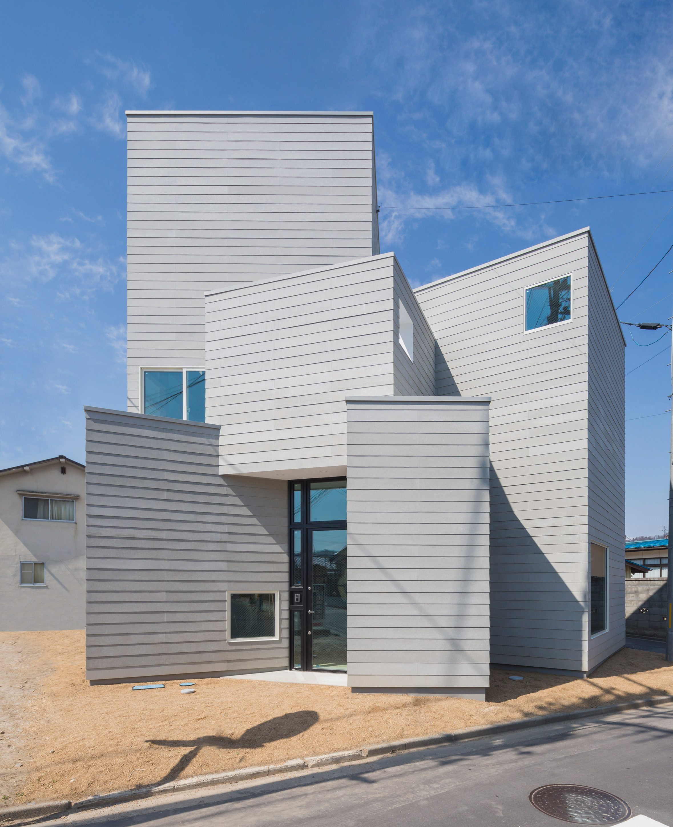 Cohta Asano builds his new Fukushima home as a cluster of nine cuboids-2