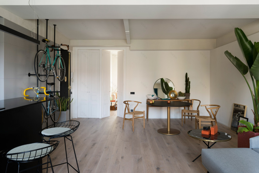 Bespoke storage creates room for bicycles in renovated Barcelona flat-11