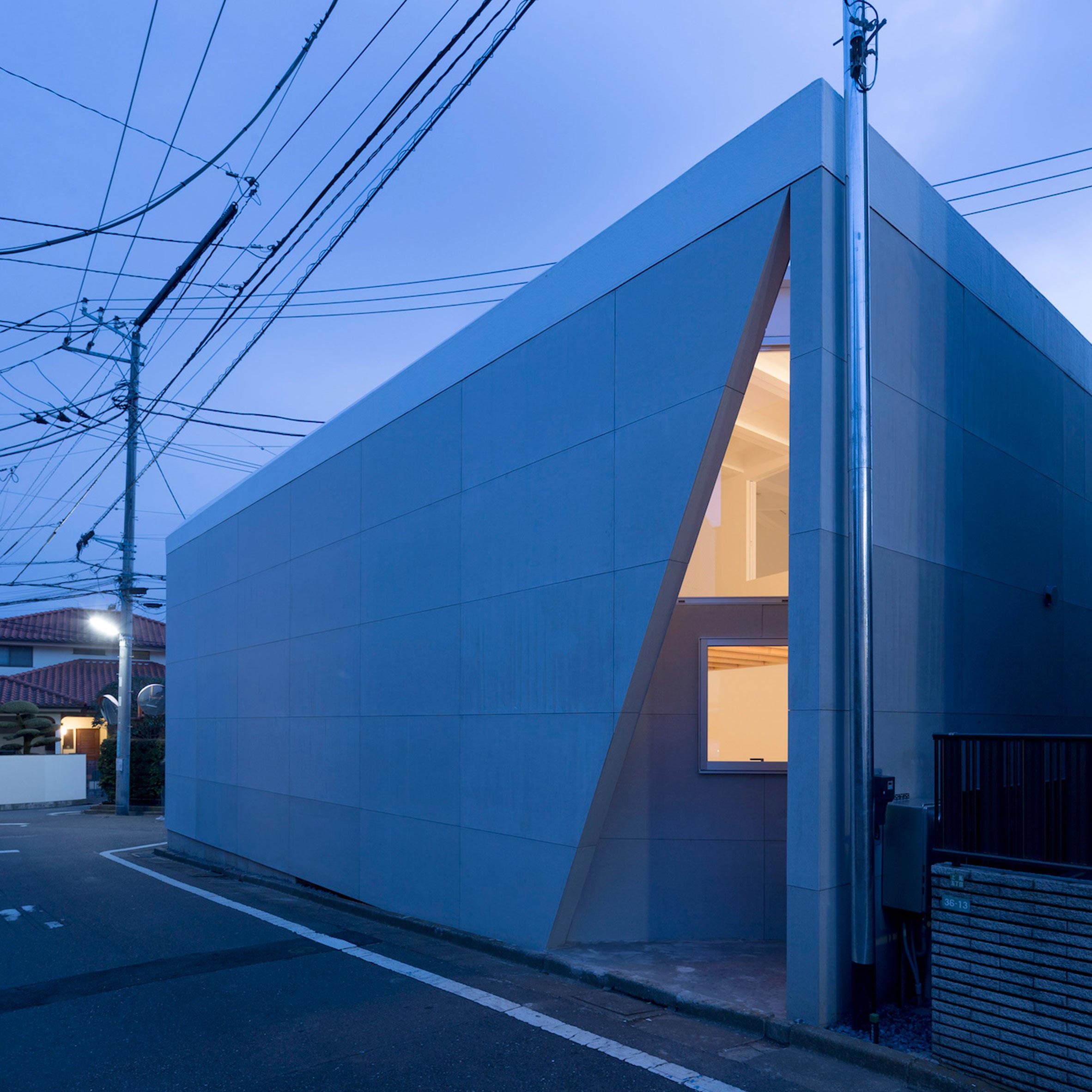 Chop + Archi cuts lightwells into corners of triangular house in Tokyo-0