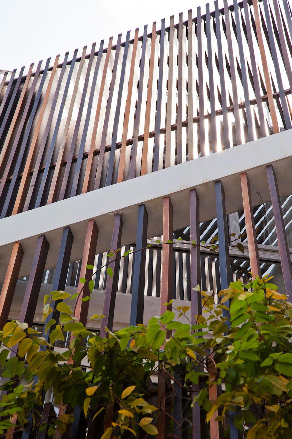 越南胡志明市 MM 建筑师打造多彩小镇房屋-8