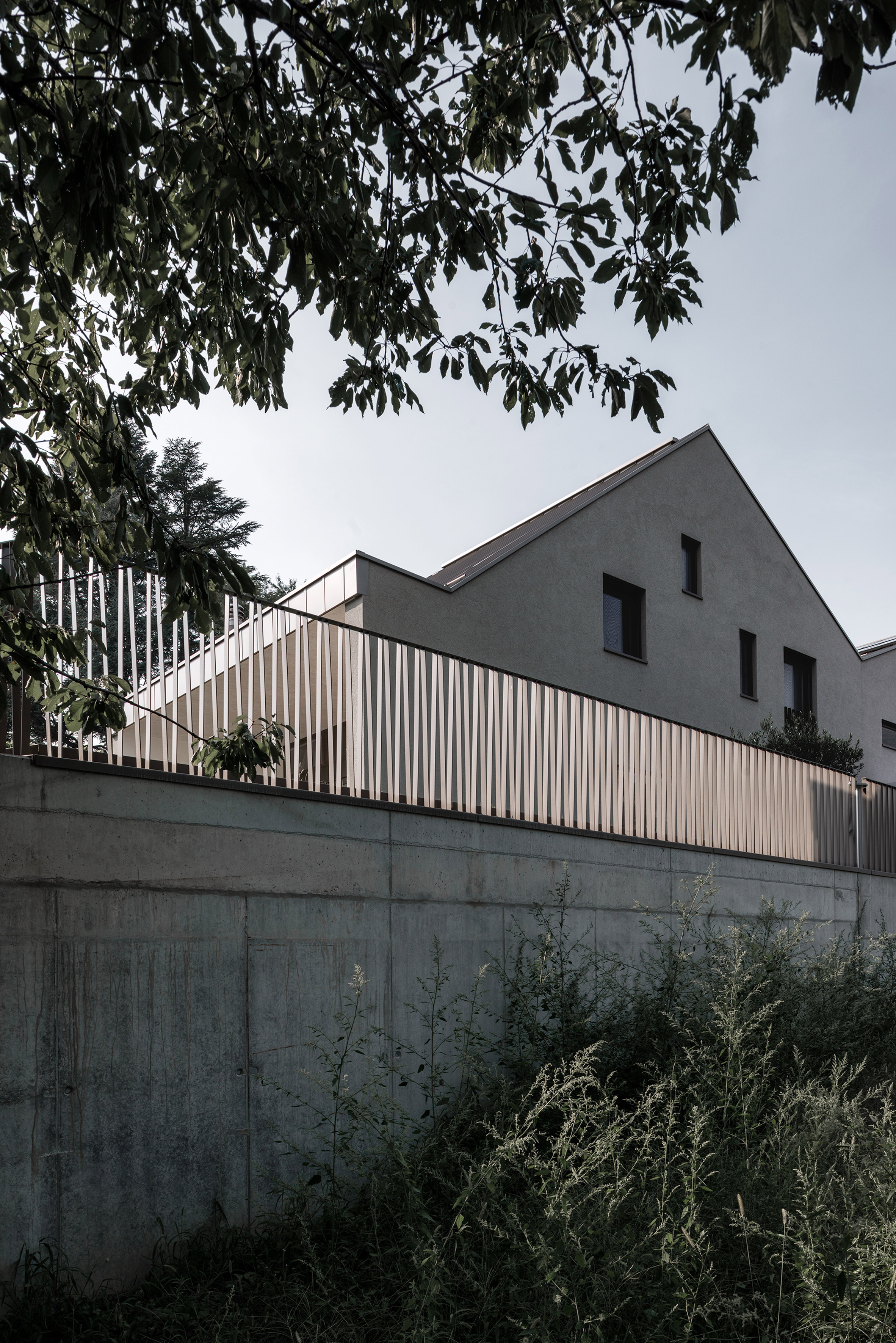 Swiss housing takes cues from mountainous landscape with zig-zag roof-2