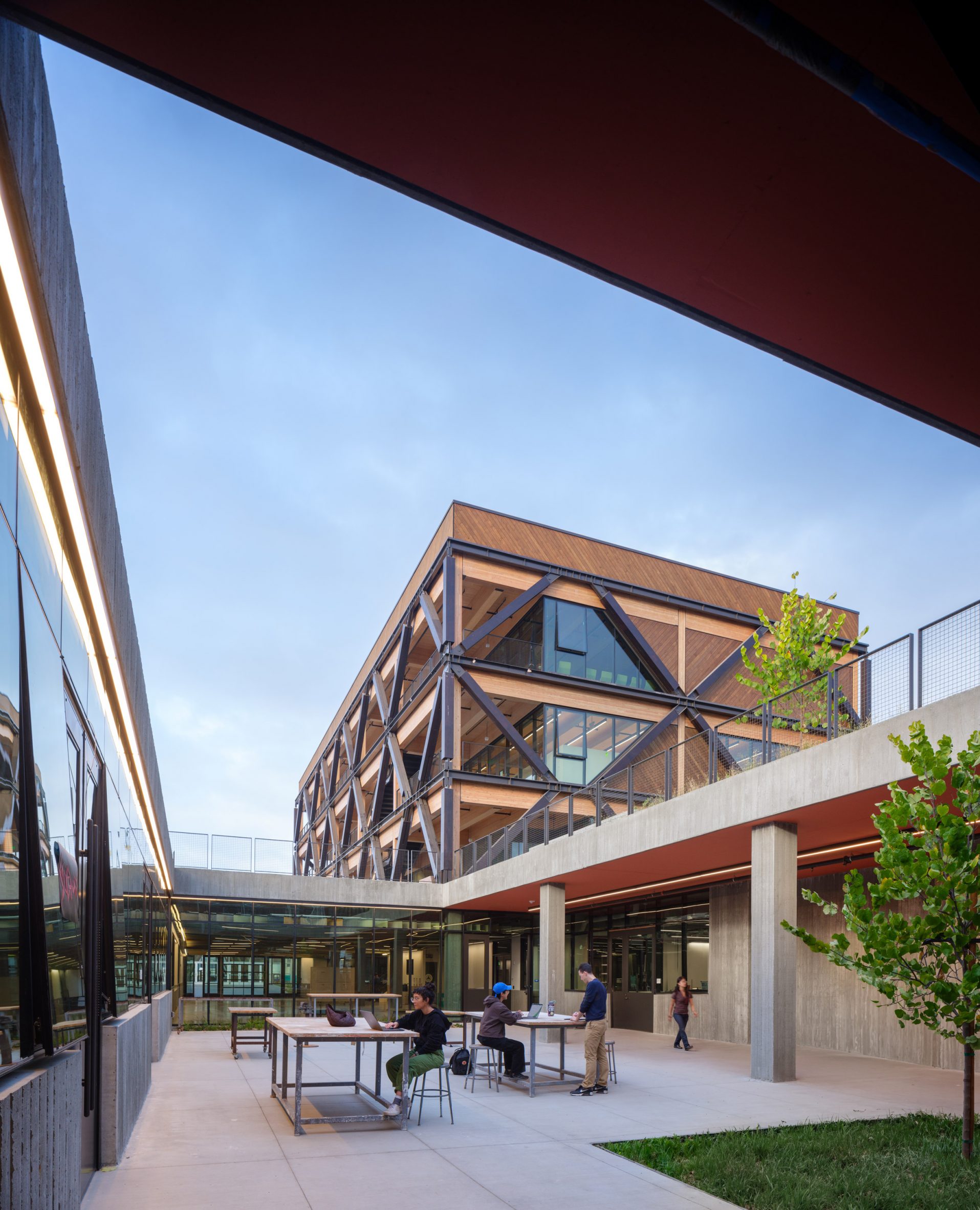 Studio Gang places "eccentric" mass-timber buildings around concrete terrace-19