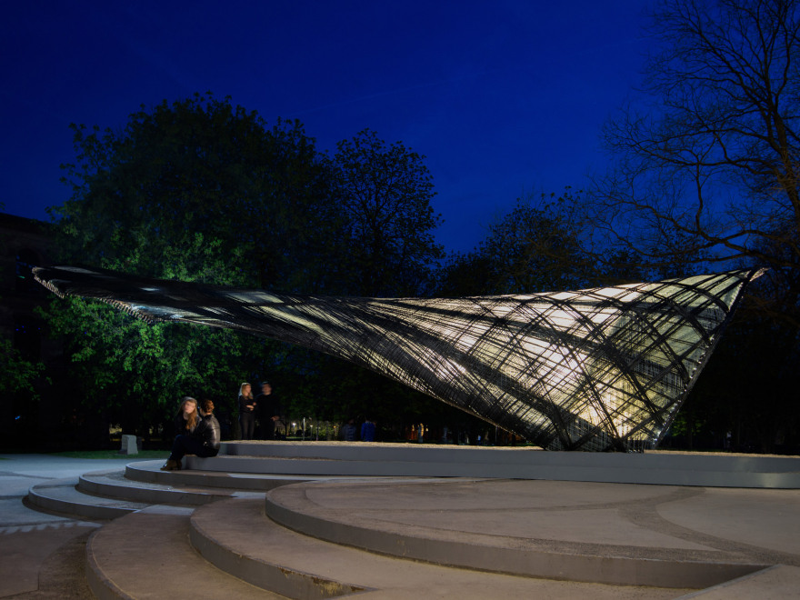 Drones and robots weave carbon-fibre pavilion based on moth webs-23