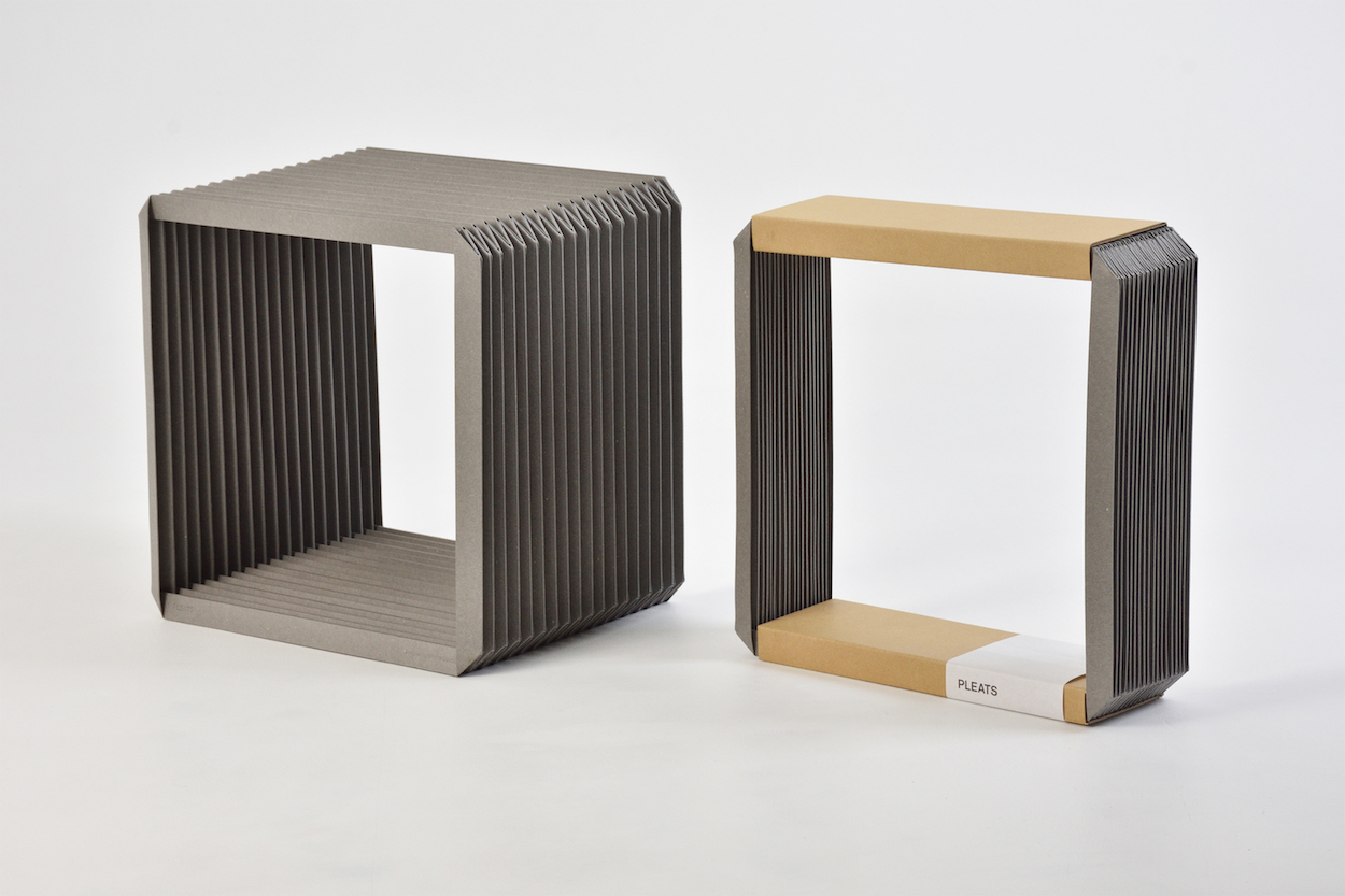Oguchi 设计的褶皱纸板架和盒钟-0