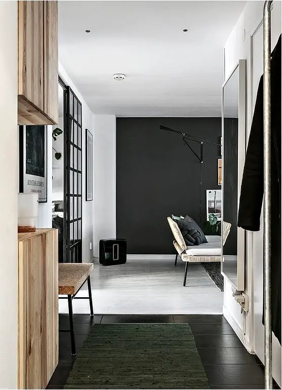 明亮与暗调交融的屋顶公寓-16