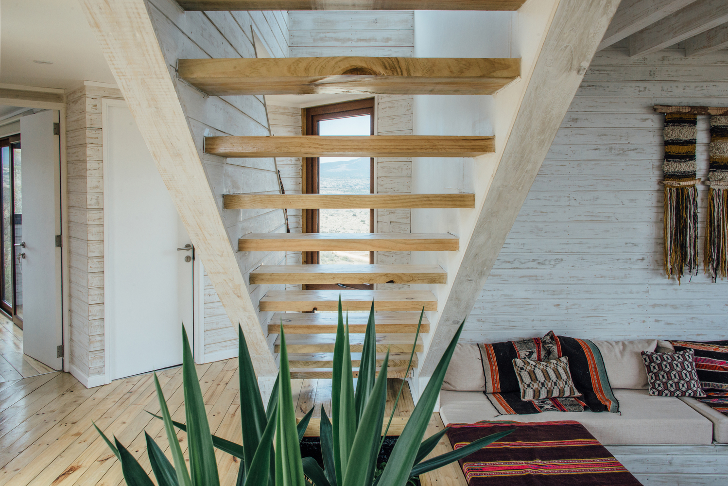 智利洛斯莫尔斯海滩木质别墅融入山脉景观-51