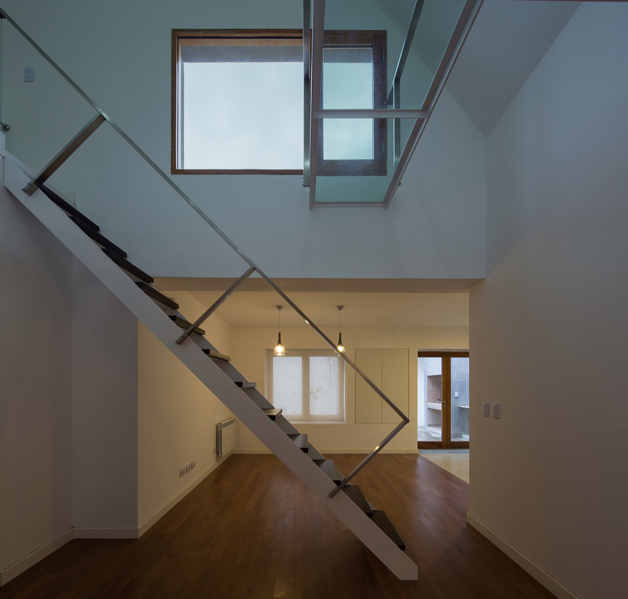 阿根廷拉潘帕别墅 | 倾斜屋顶下的生活空间-30