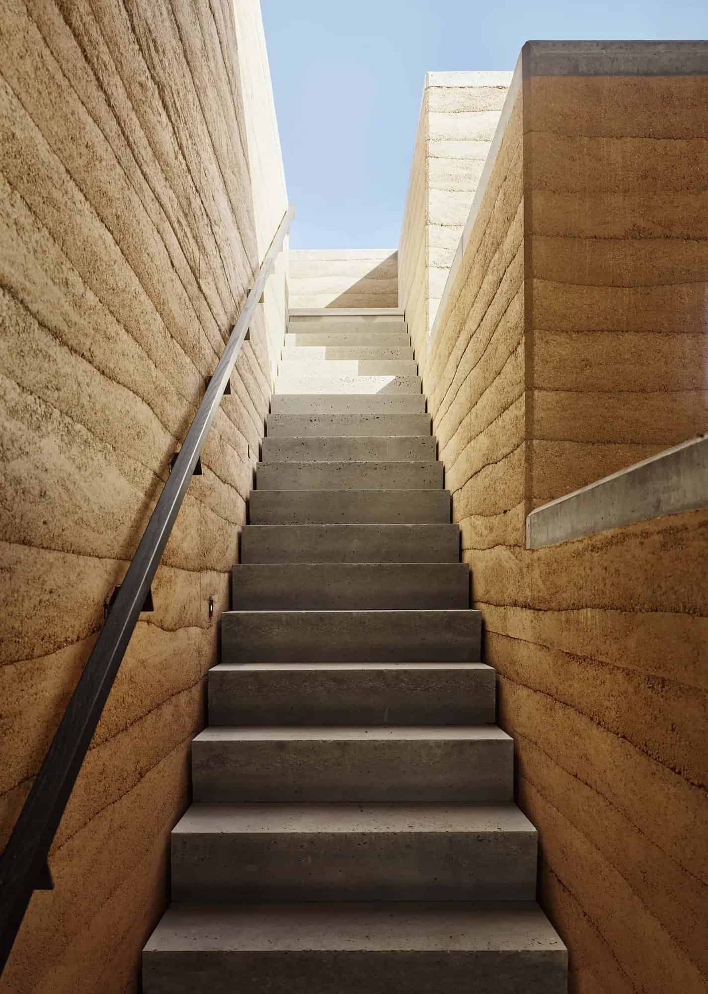 See this remarkable rammed earth house nestled on a Texas ranch-23