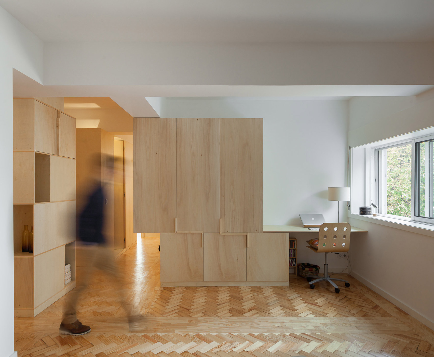 Cubículo Arquitectos installs birch-plywood storage units inside Porto flat-4