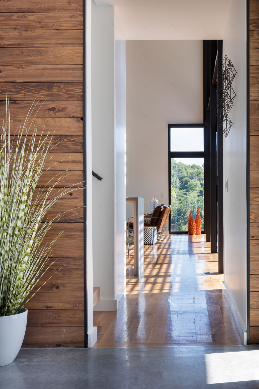 Kem Studio wraps lakeside Missouri residence in cypress and white stucco-16