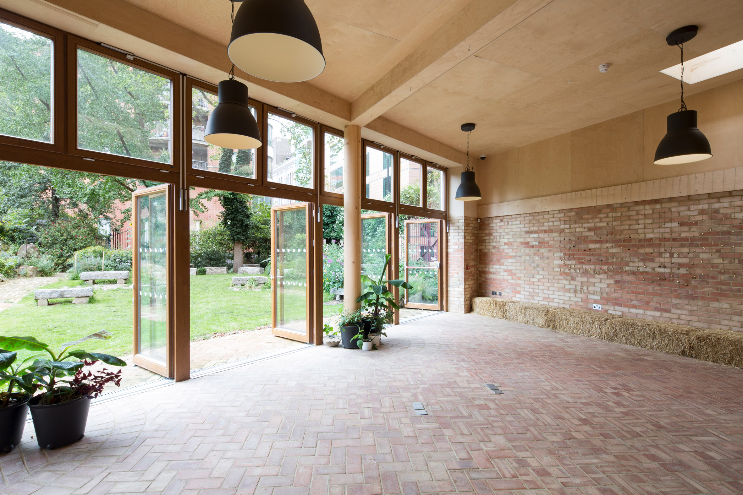 Office Sian adds brick and limestone building to London community garden-13