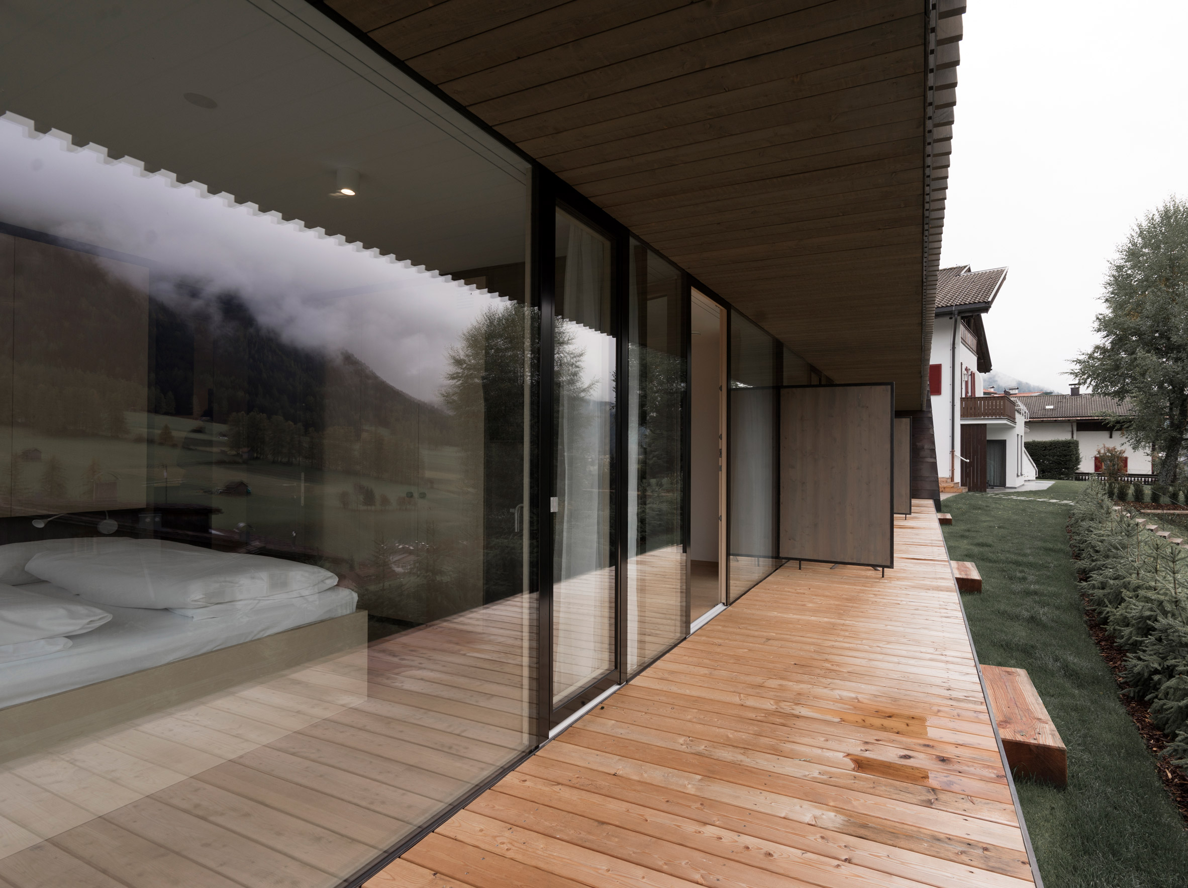 Plasma's copper-clad apartments have huge windows facing Dolomites-12