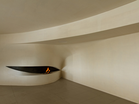 Next Office covers house near Tehran in a curved concrete facade-19