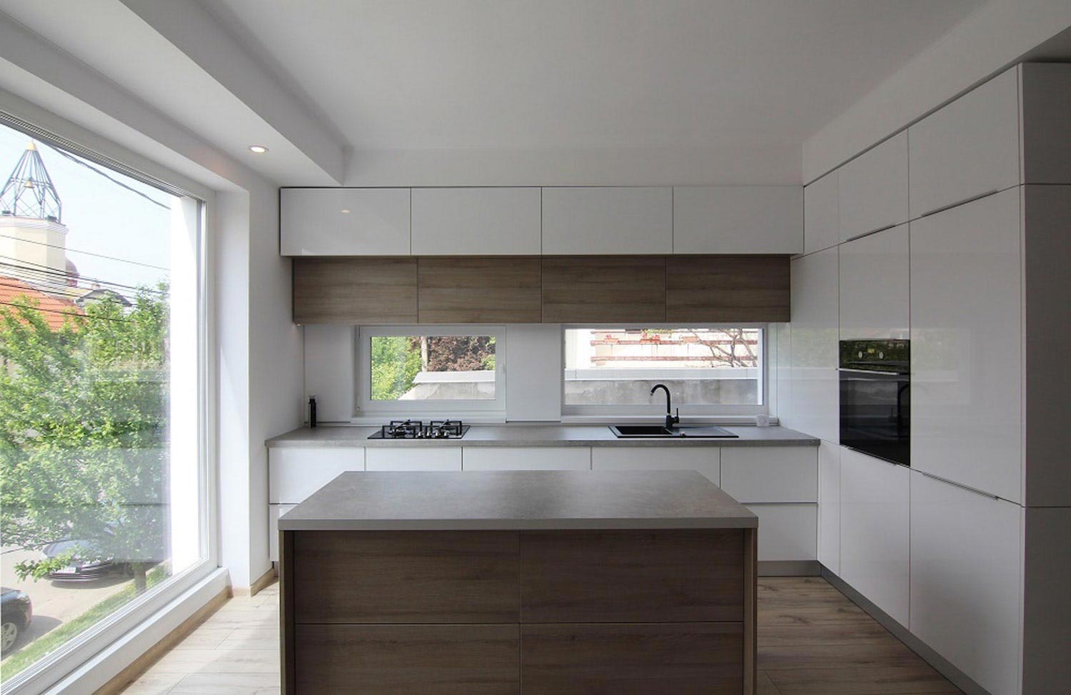 Project built on a very small piece of land with minimal modern features and design defined by white, black and timber hues   CAANdesign  Architecture and home design blog-6