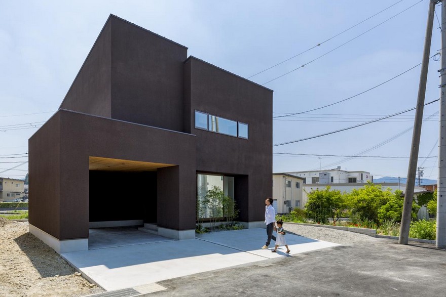 Box-Shaped Japanese Home with Warm Minimalist Interior Design-1
