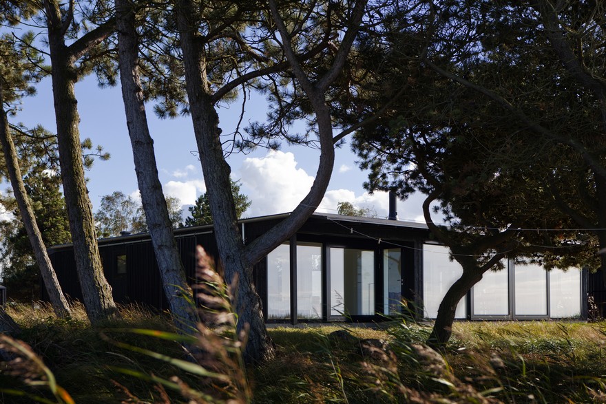 Modern Wooden House with Clean Lines and a Transparent Design-26