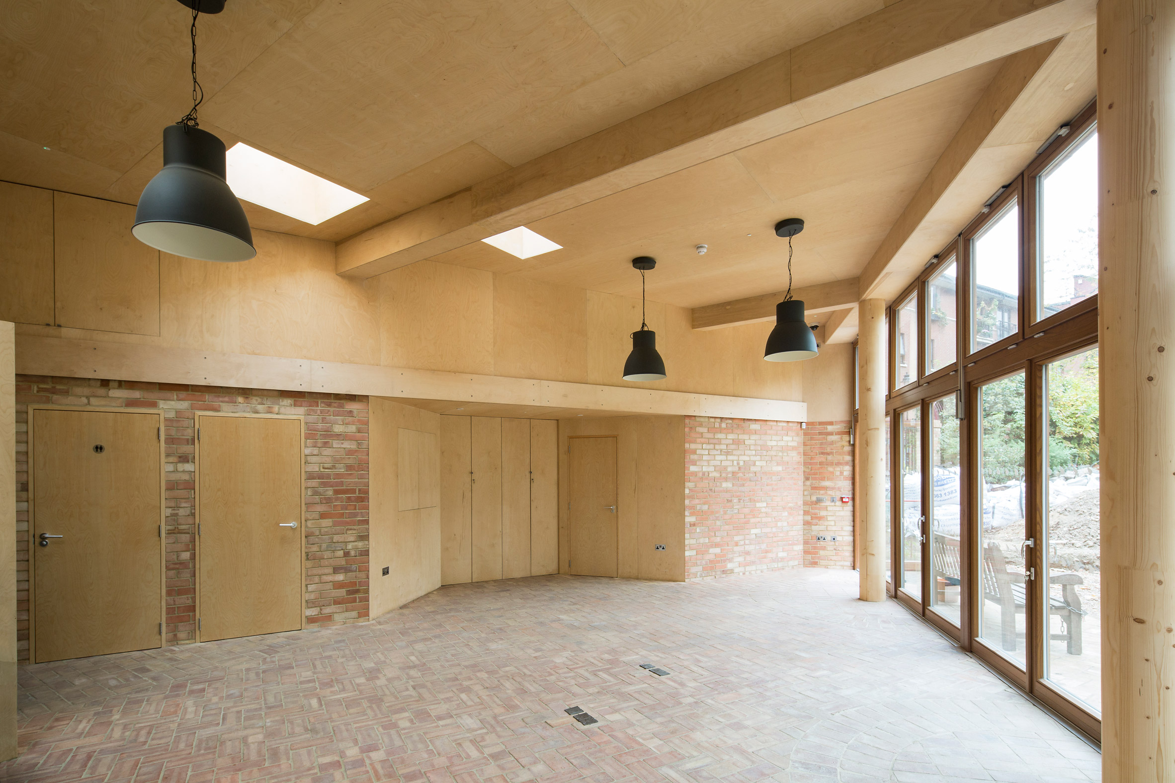 Office Sian adds brick and limestone building to London community garden-11
