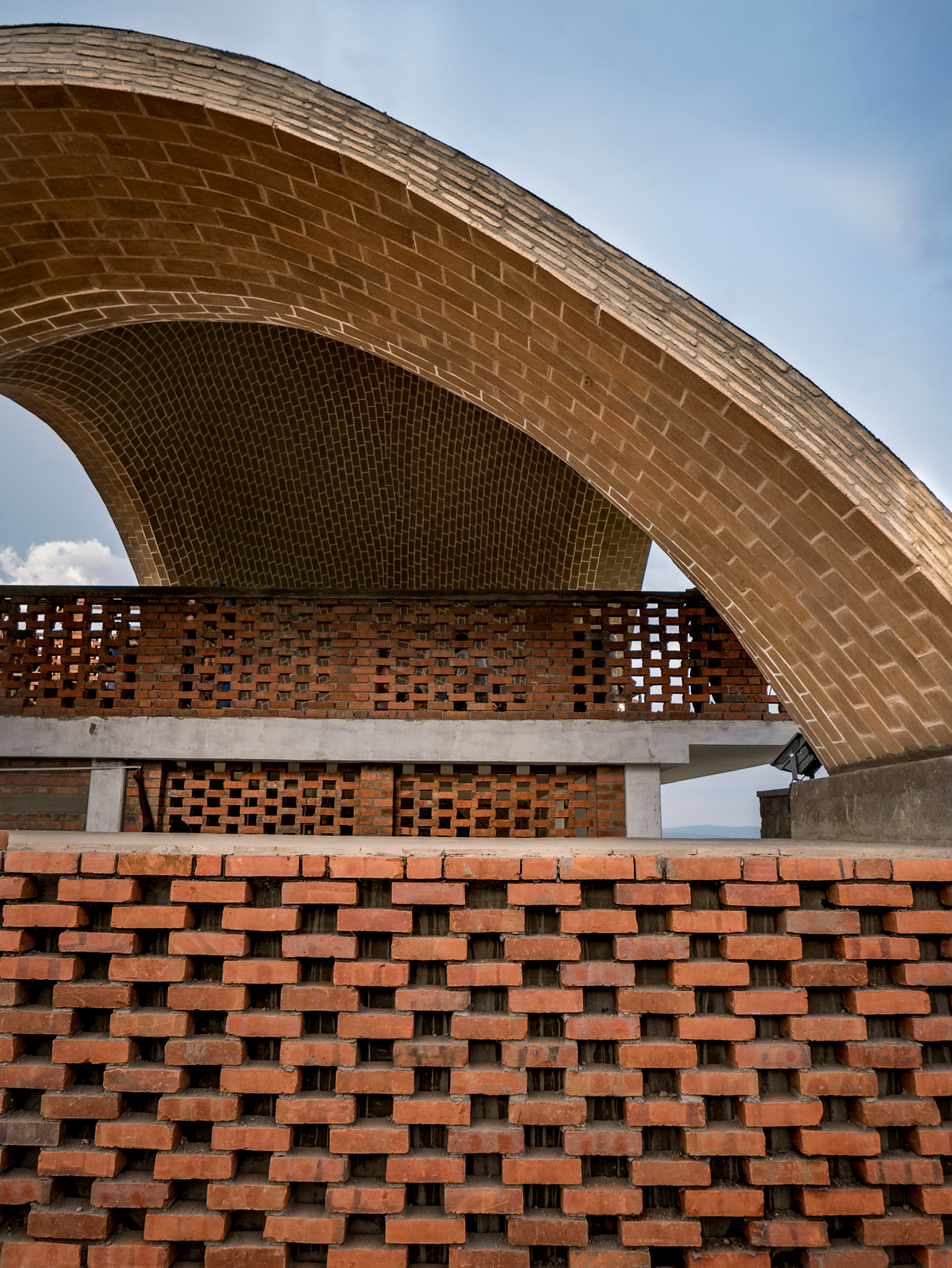 Light Earth Designs creates sustainable cricket pavilion featuring self-supporting parabolic roofs-24