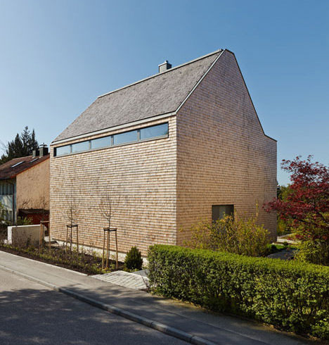 Stuttgart house by (se)arch with shingle-clad walls and an art gallery-6