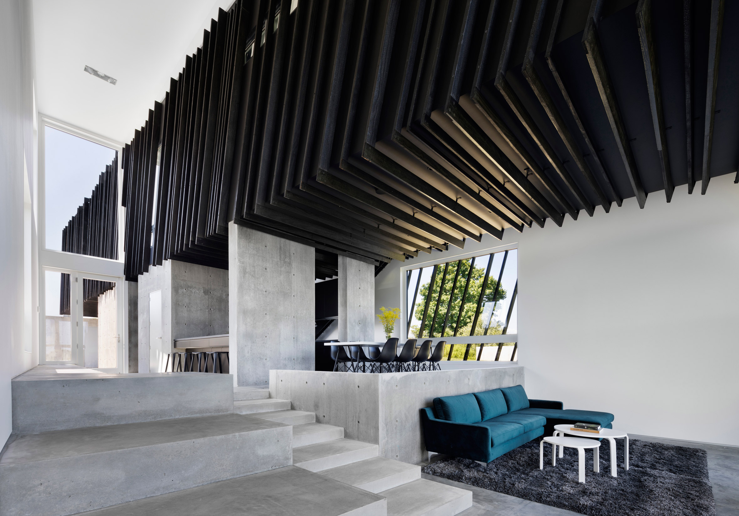 A/O builds slanted black holiday home in Hudson Valley-7