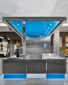 Stainless steel and blue details decorate modular Valley Fair Kiosk for Blue Bottle Coffee