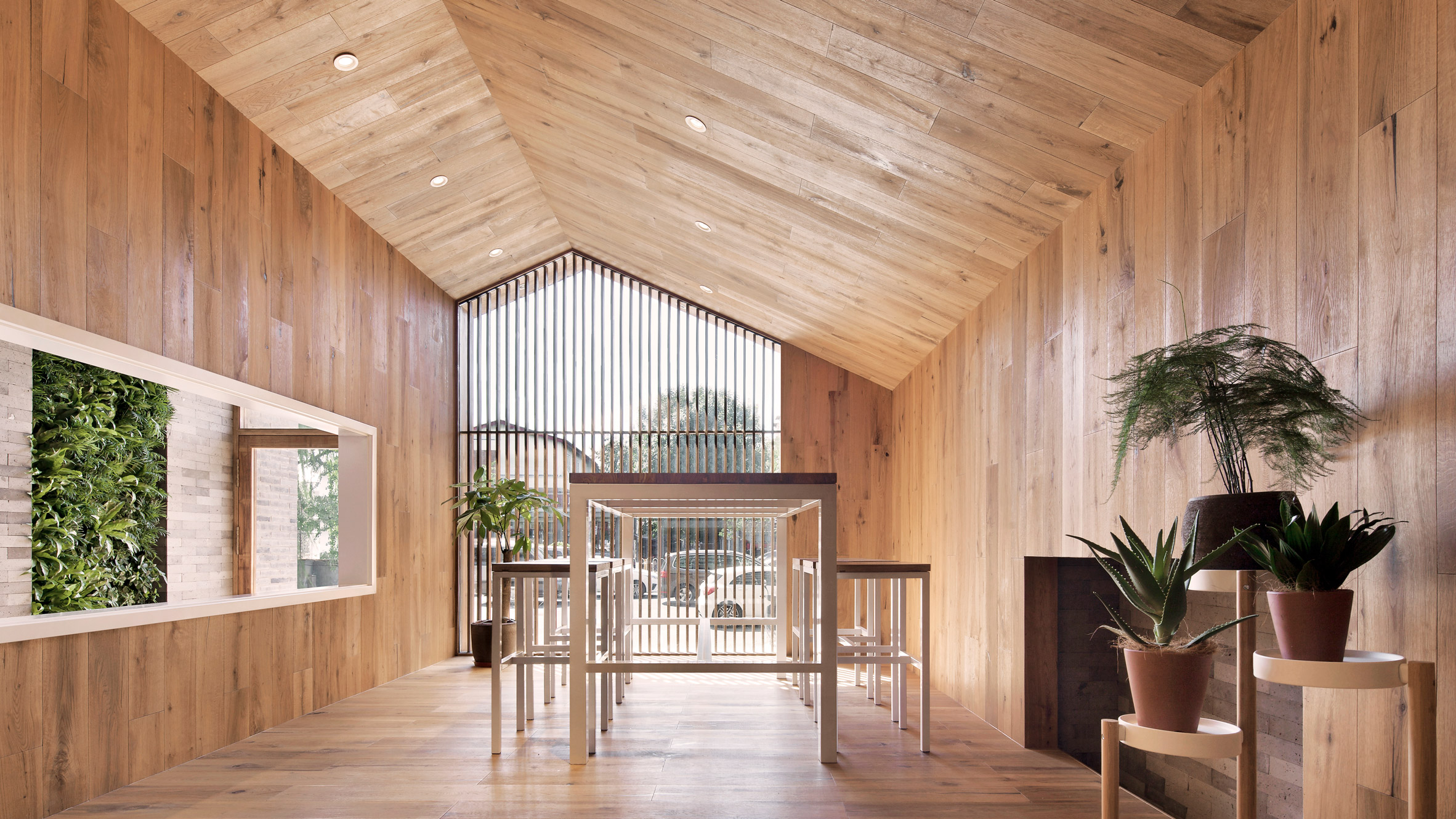 Penda inserts house-shaped opening into facade of hotel in Beijing hutong-10