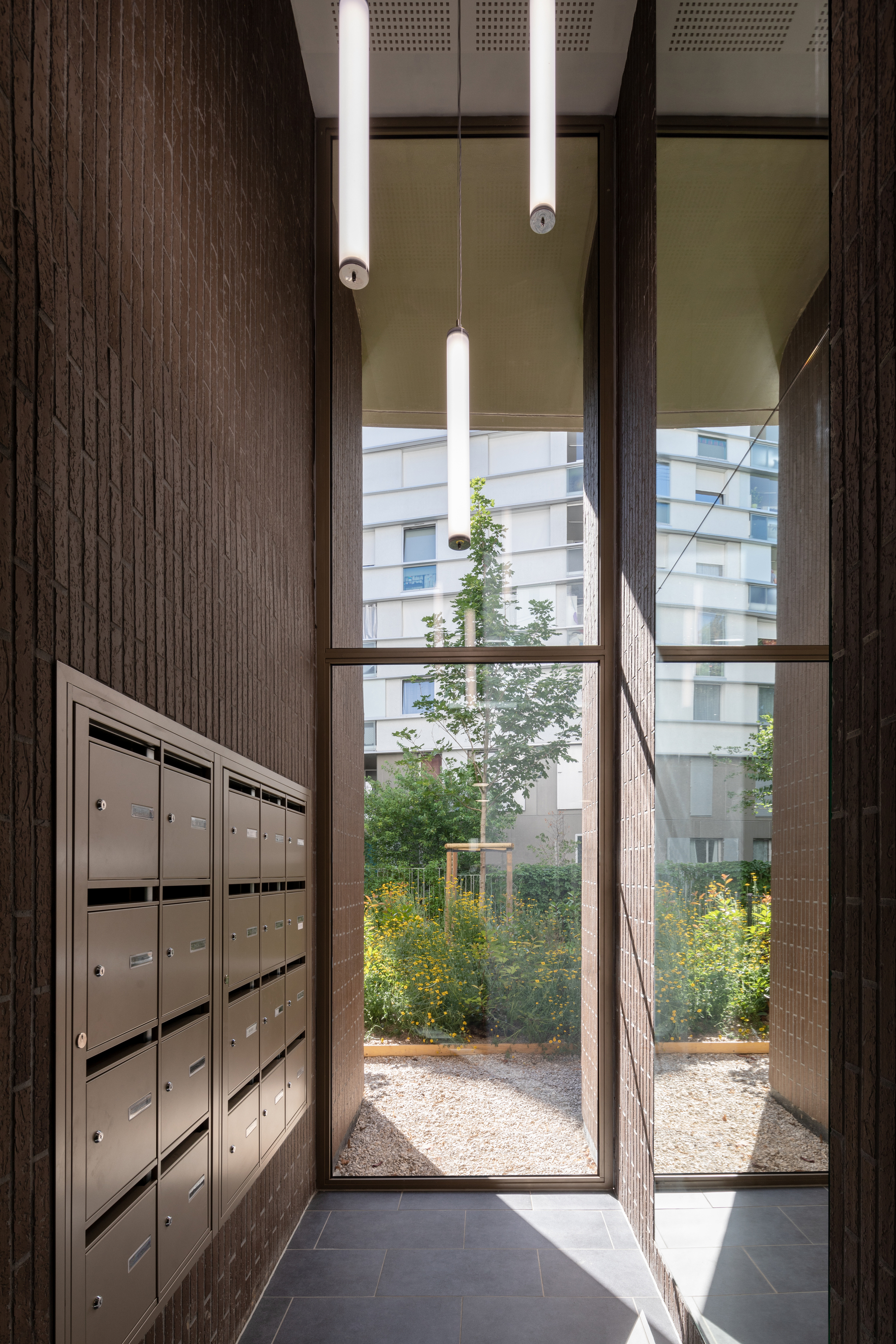 46 Apartments in Gentilly / Tectône-37