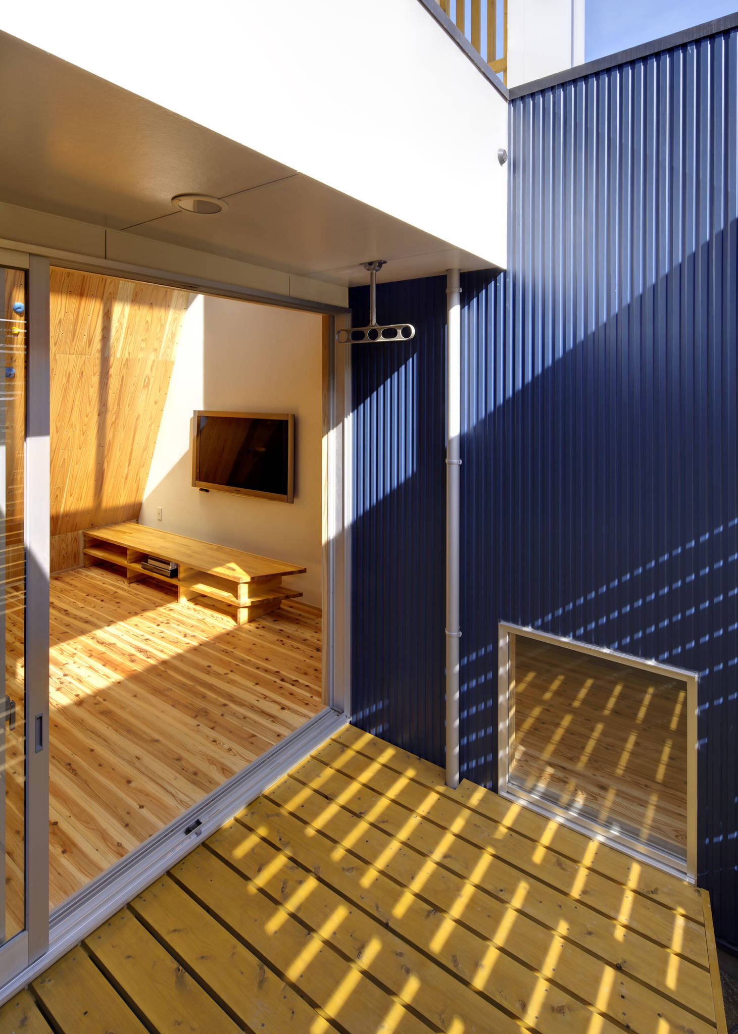 日本福冈简约住宅 | 攀岩墙与自然光的完美融合-10