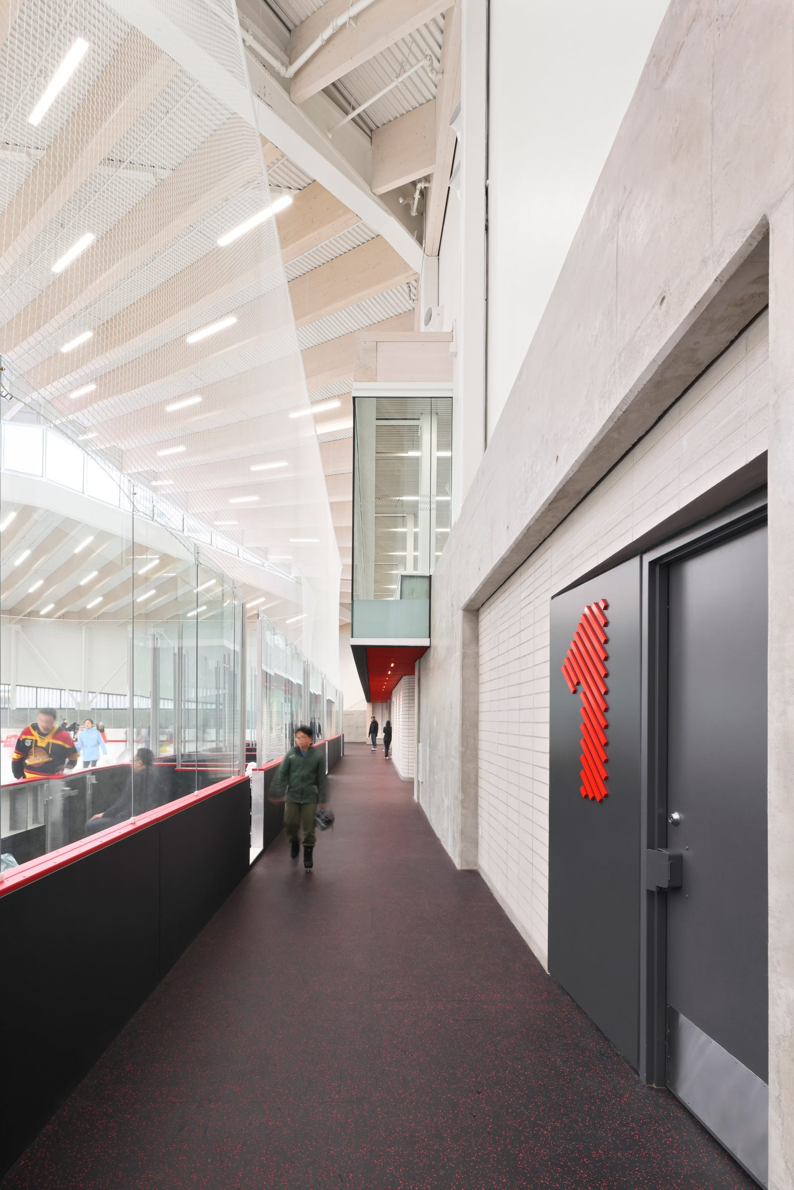Mass timber adds visual warmth to British Columbia ice arena by HCMA-31