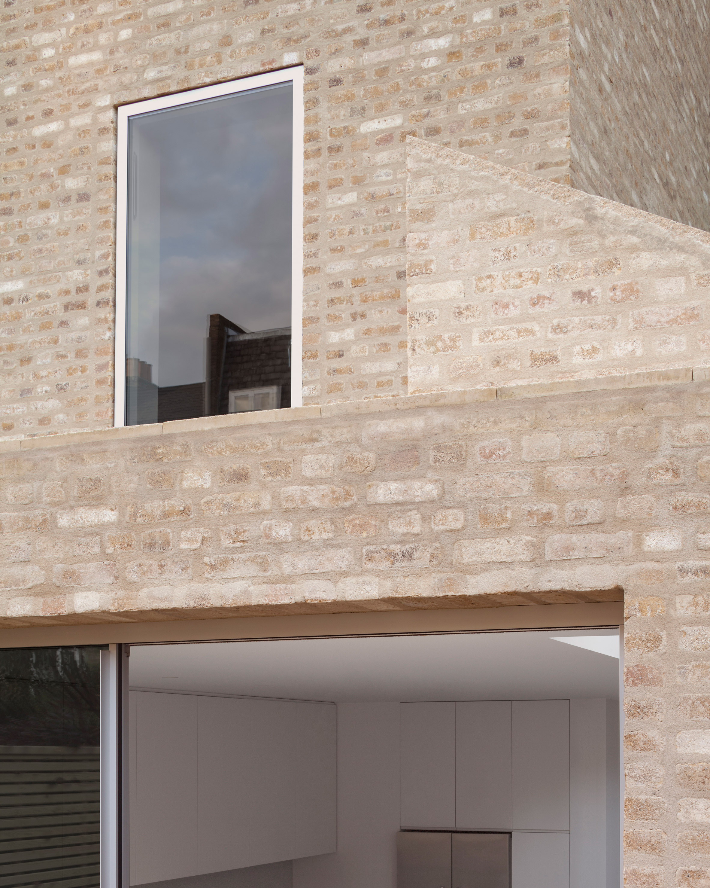 Al-Jawad Pike uses pale, exposed materials to extend west London home-8