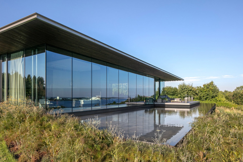 波兰现代河畔别墅，自然与人居的完美融合-16