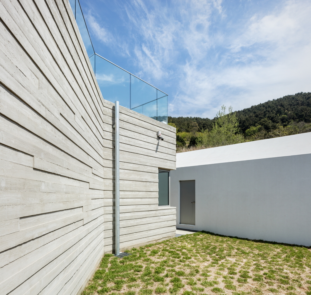 韩国海滨小屋,自然与建筑的和谐融合-32