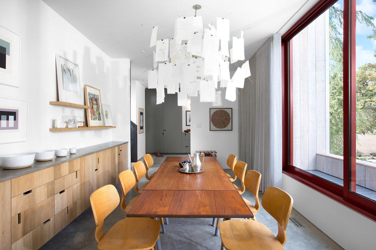 Measured Architecture has designed this modern house that opens up to a backyard patio area with a green wall   CAANdesign  Architecture and home design blog-8