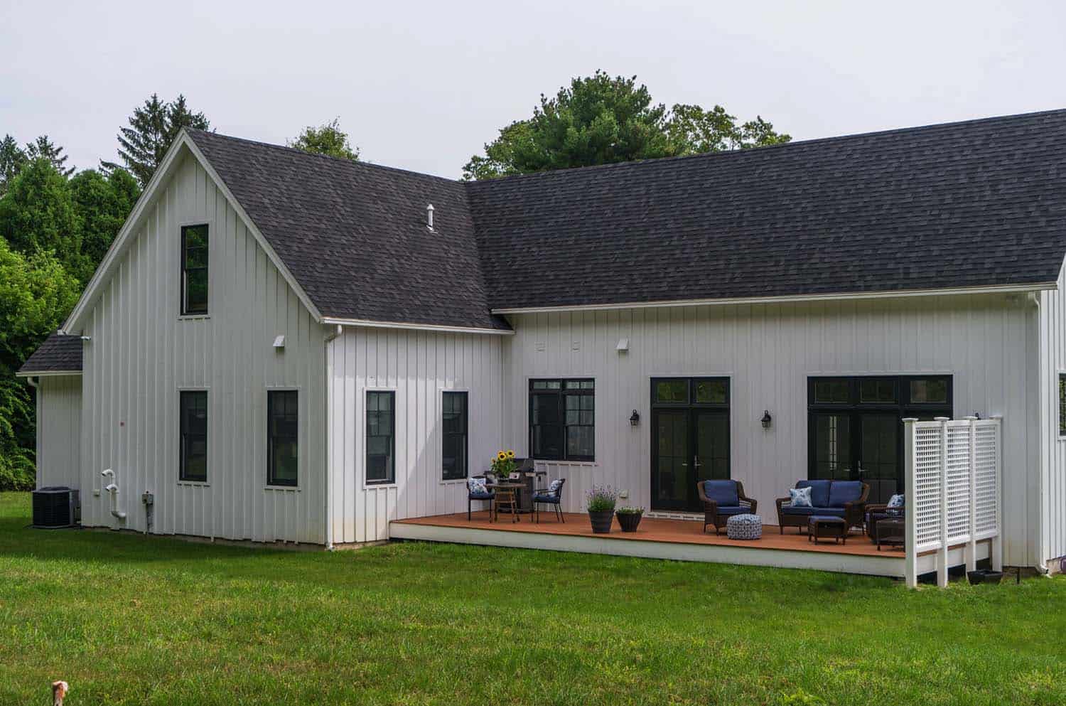 Modern farmhouse style nestled in an idyllic woodsy New England setting-14