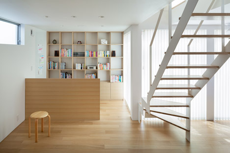 House K by Yuji Kimura Design conceals terraces behind a tall wall-20