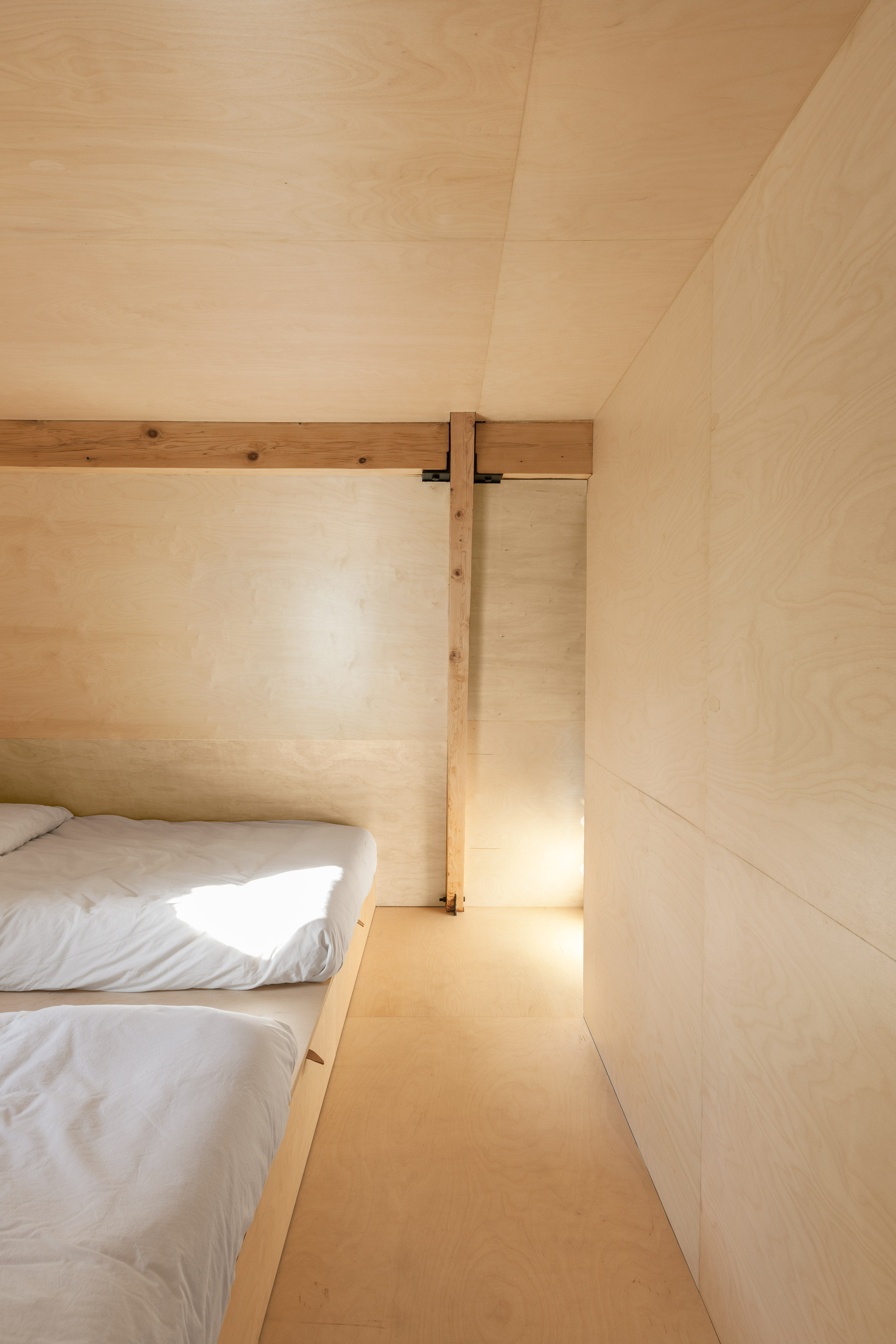 Jean Verville overhauls A-frame cottage in the Quebec forest-16