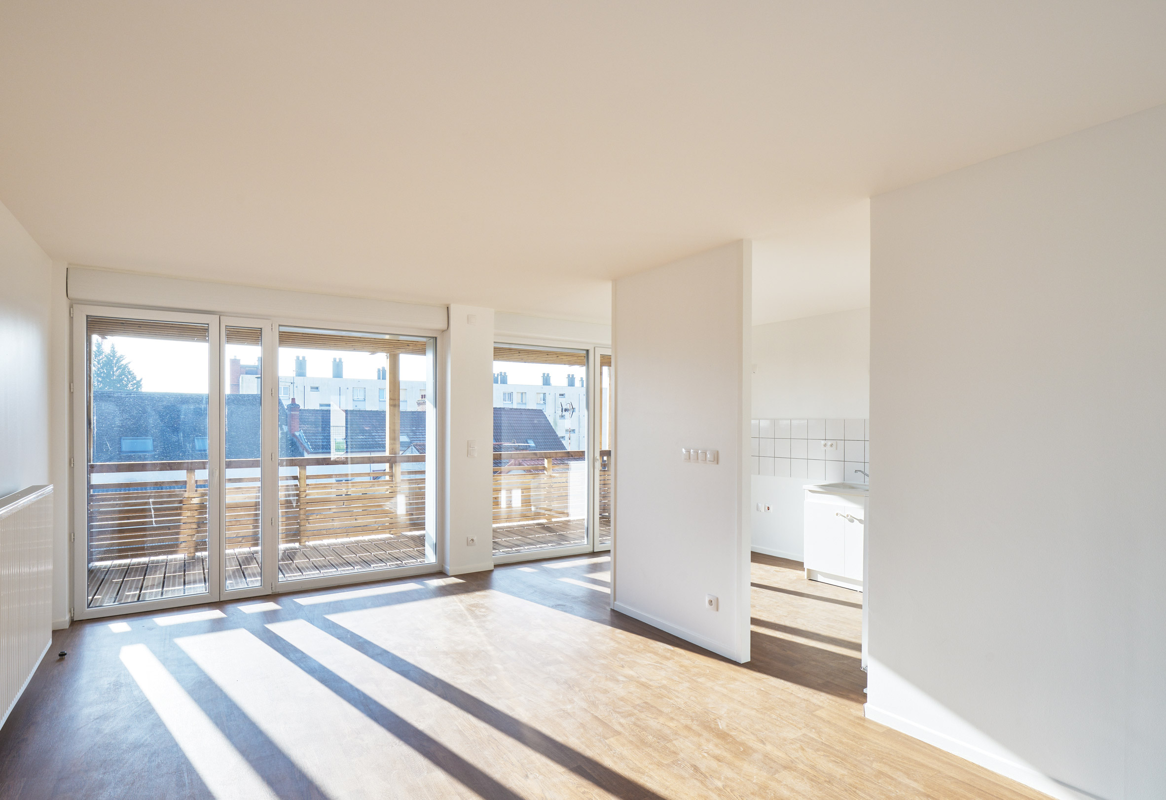 Odile Guzy Architectes covers social housing with vertical wooden slats-18